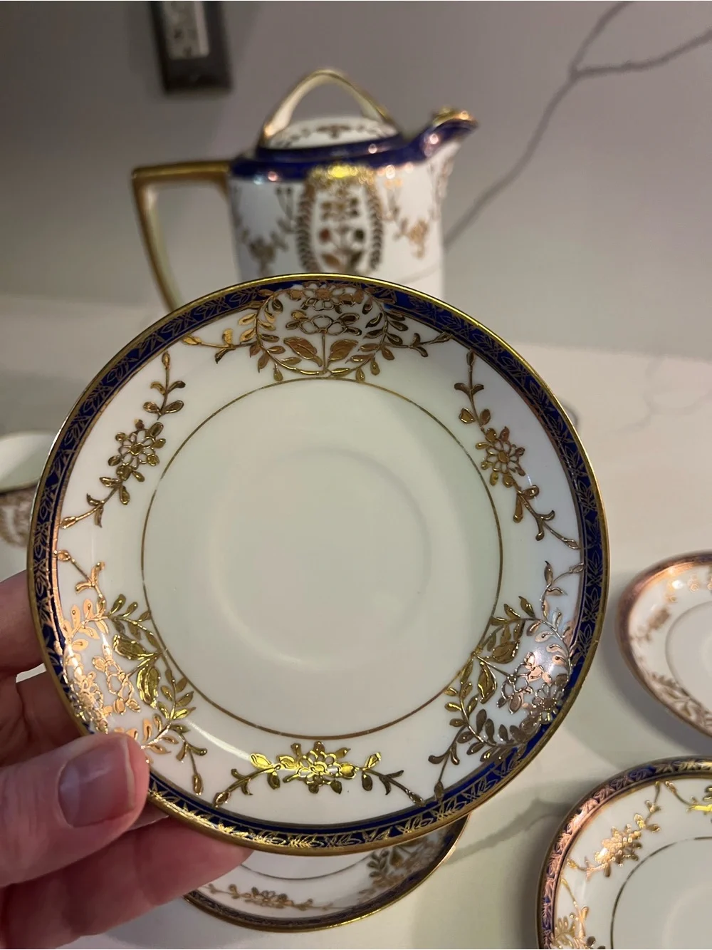 Elegant White Porcelain Coffee/Tea Set with Dark Blue and Gold Trim